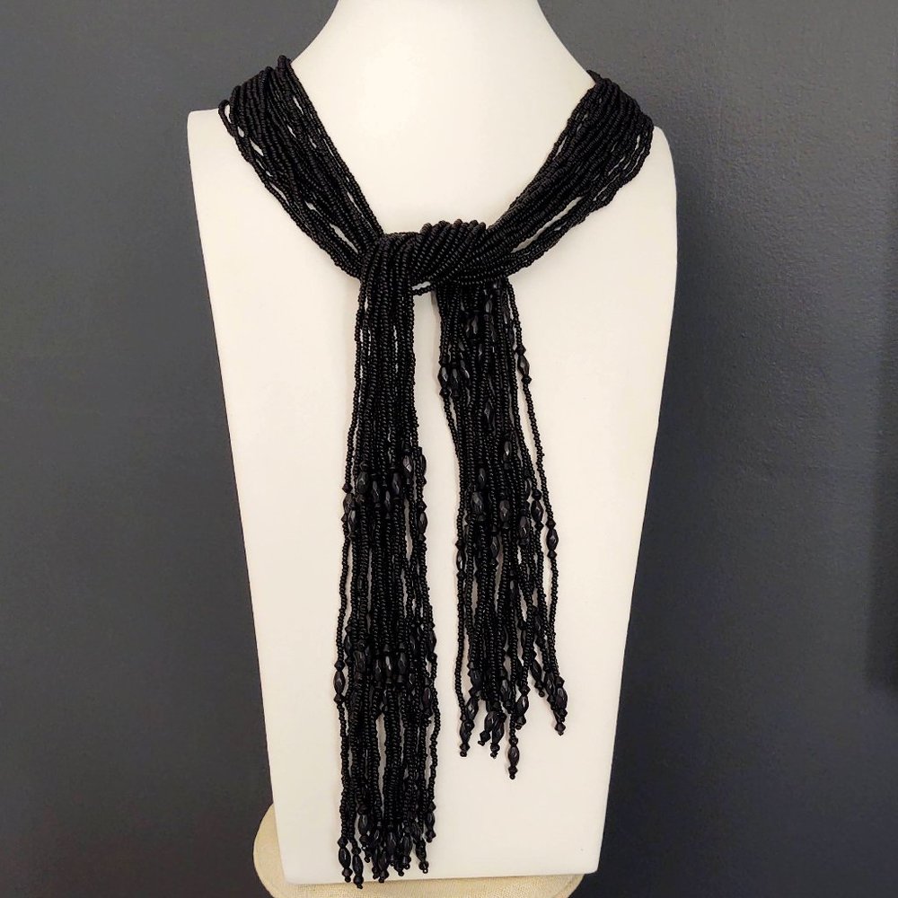 Long multi loose strand jet black beaded necklace